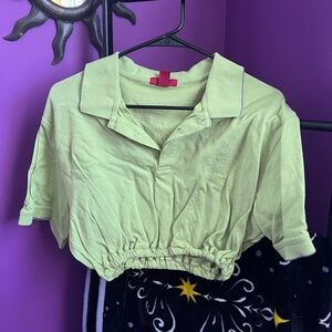 Green cropped polo shirt
